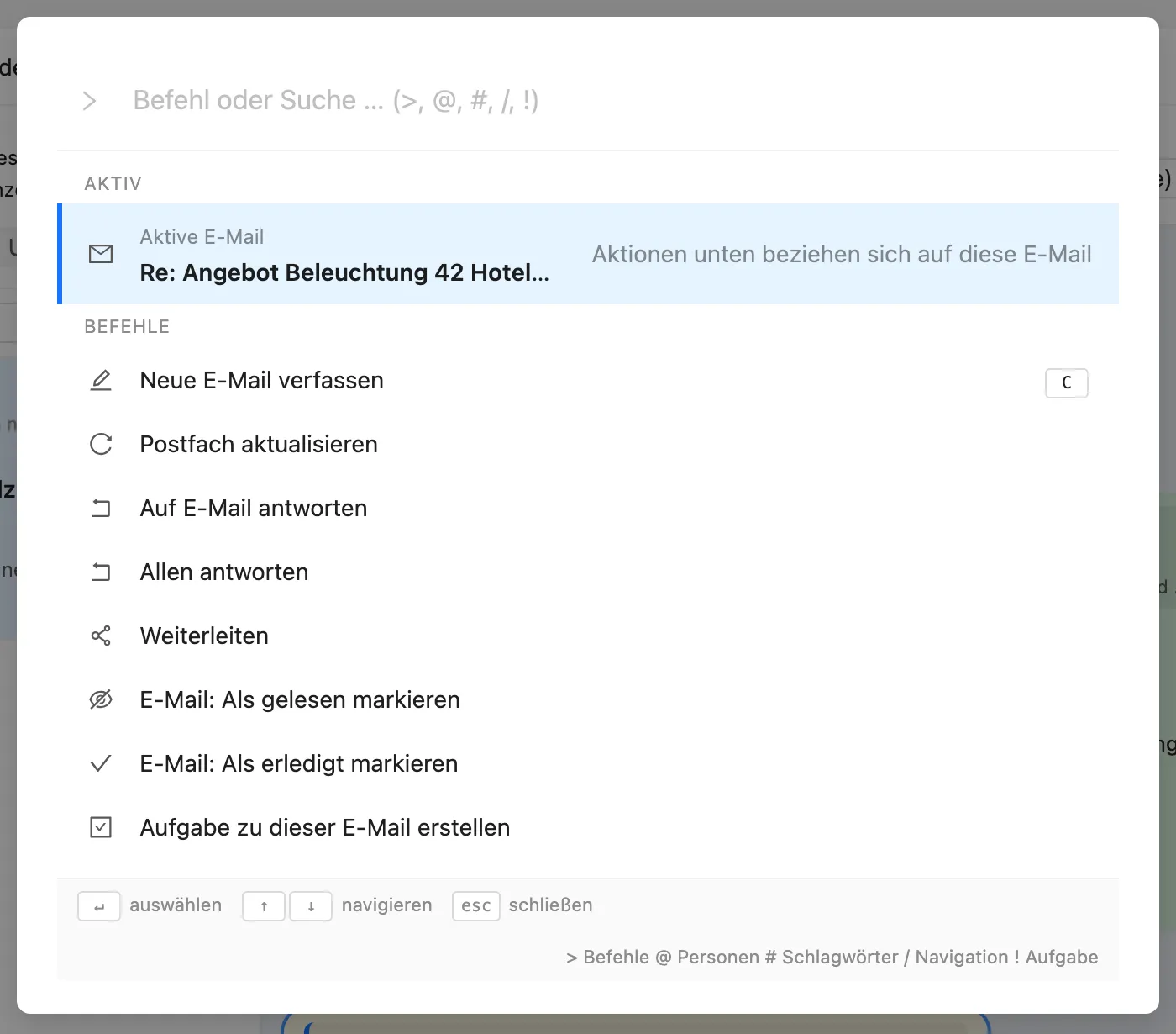 Befehlspalette über der App: Neue E-Mail verfassen, Auf E-Mail antworten, Weiterleiten, Als gelesen markieren, Aufgabe zu dieser E-Mail erstellen.